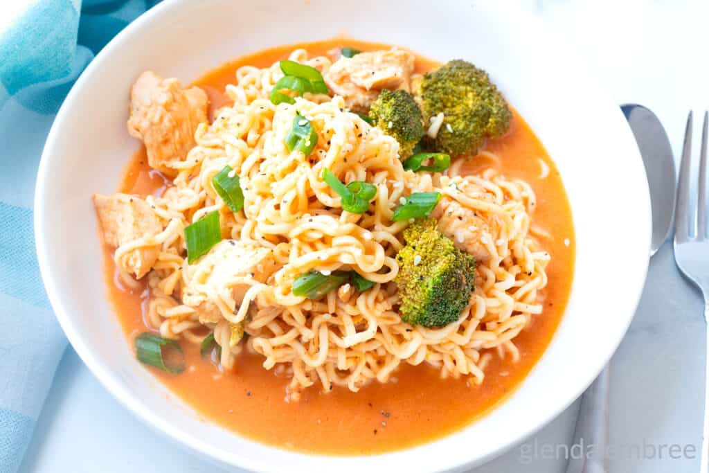 Spicy Chicken Ramen Noodles (Curry Ramen) in a white ceramic bowl.
