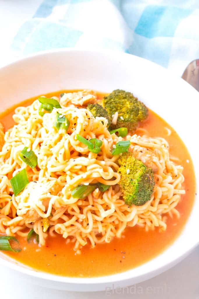 Spicy Chicken Ramen Noodles (Curry Ramen) in a white ceramic bowl.
