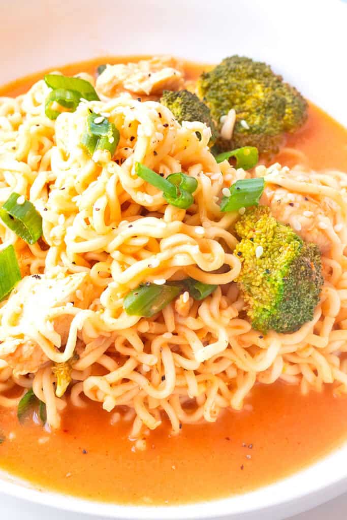Spicy Chicken Ramen Noodles (Curry Ramen) in a white ceramic bowl.