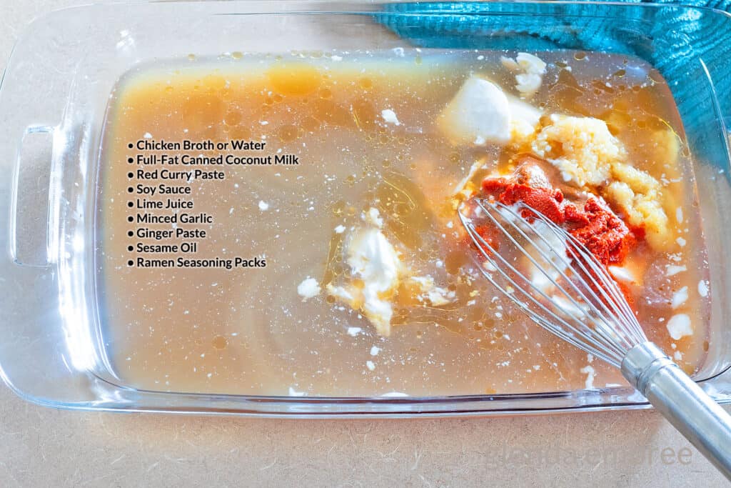 Ingredients for Spicy Chicken Ramen Noodles sauce in a clear glass 9x13 baking dish.